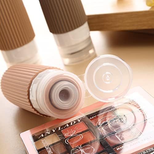 51TQmC58FGL._AC_.jpg Mrsdry Travel Bottles for Toiletries, Tsa Approved 3oz Portable Travel Bottles, BPA Free Leak Proof Squeezable Silicone Travel Size Containers, Travel Accessories with Clear Toiletry Bag (4 Pack)